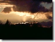 Z�pad slunce nad lesem...